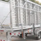 Aluminum trailer on a road.
