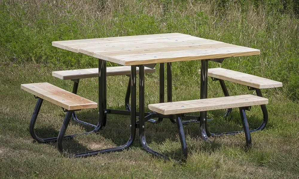 Outdoor picnic table with metal frame and wooden benches.