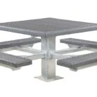 Aluminum picnic table with four seats and a mesh top.