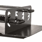 Grill side view with metal support and green background.