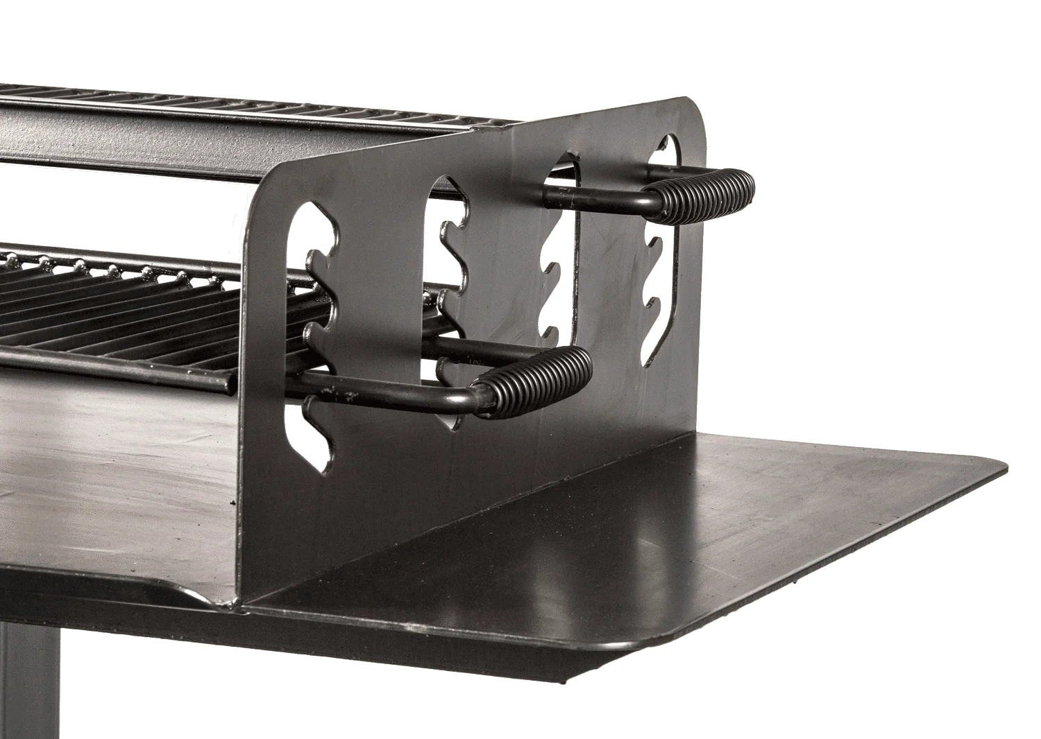Grill side view with metal support and green background.