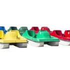 Pedal boats in various colors.