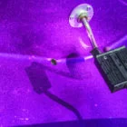 Purple light projector on a purple surface.