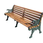 Wooden bench with metal armrests and legs.