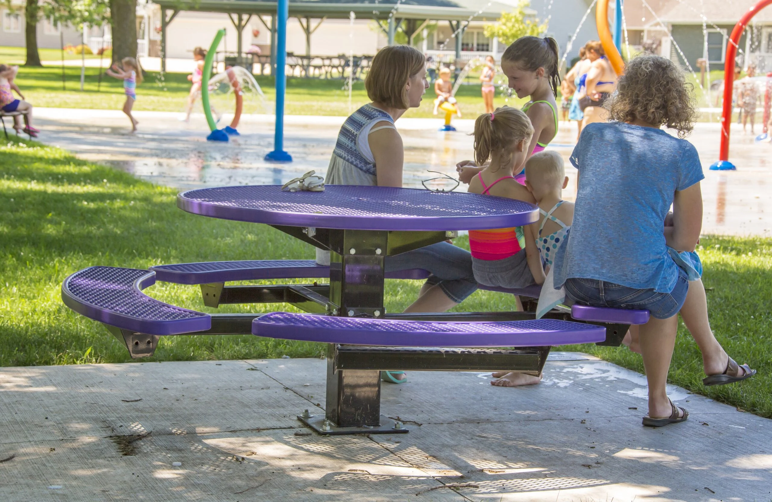 Children playing at a park playground.
