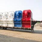 Colorful storage tanks on a trailer.