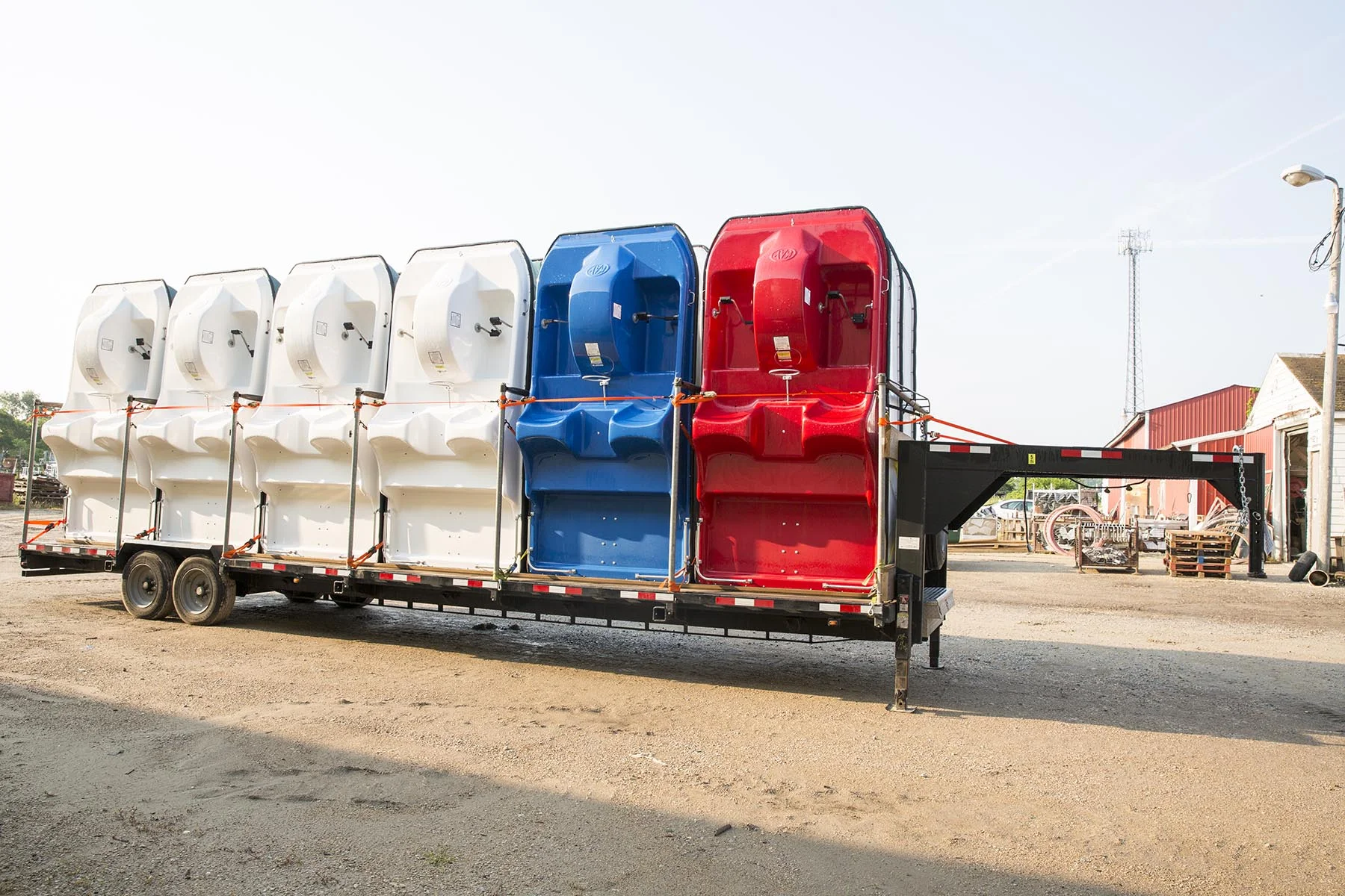 Colorful storage tanks on a trailer.