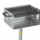 Portable metal grill on a stand.