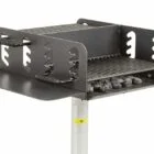 Portable grill on a stand.