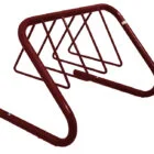 Maroon metal bike rack on white background.