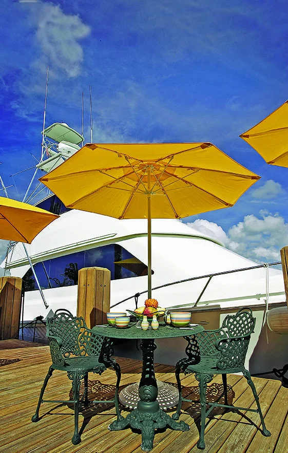 Yellow umbrella on a boat deck.