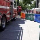 Red fire truck parked on a city street.