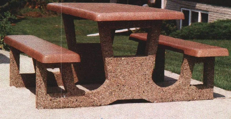 Outdoor concrete picnic table and benches.