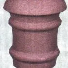 Red cylindrical object with textured surface.