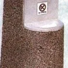Outdoor trash can with textured surface and black top.