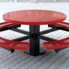 Red round picnic table with black legs and mesh seating.