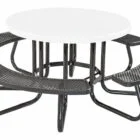 Round picnic table with black metal benches and a white top.