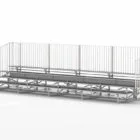 Stadium bleachers with metal railing and steps.