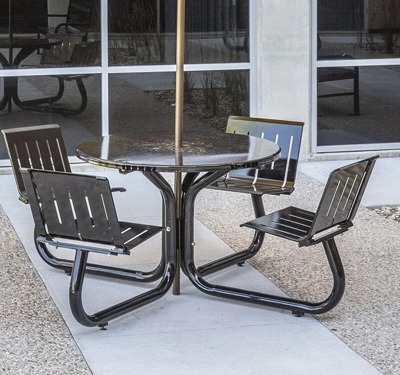 Outdoor patio table and chairs with umbrella.