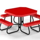 Red hexagonal picnic table with black legs and benches.