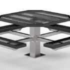 Outdoor picnic table with mesh top and benches.