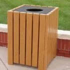 Wooden trash can on a sidewalk.