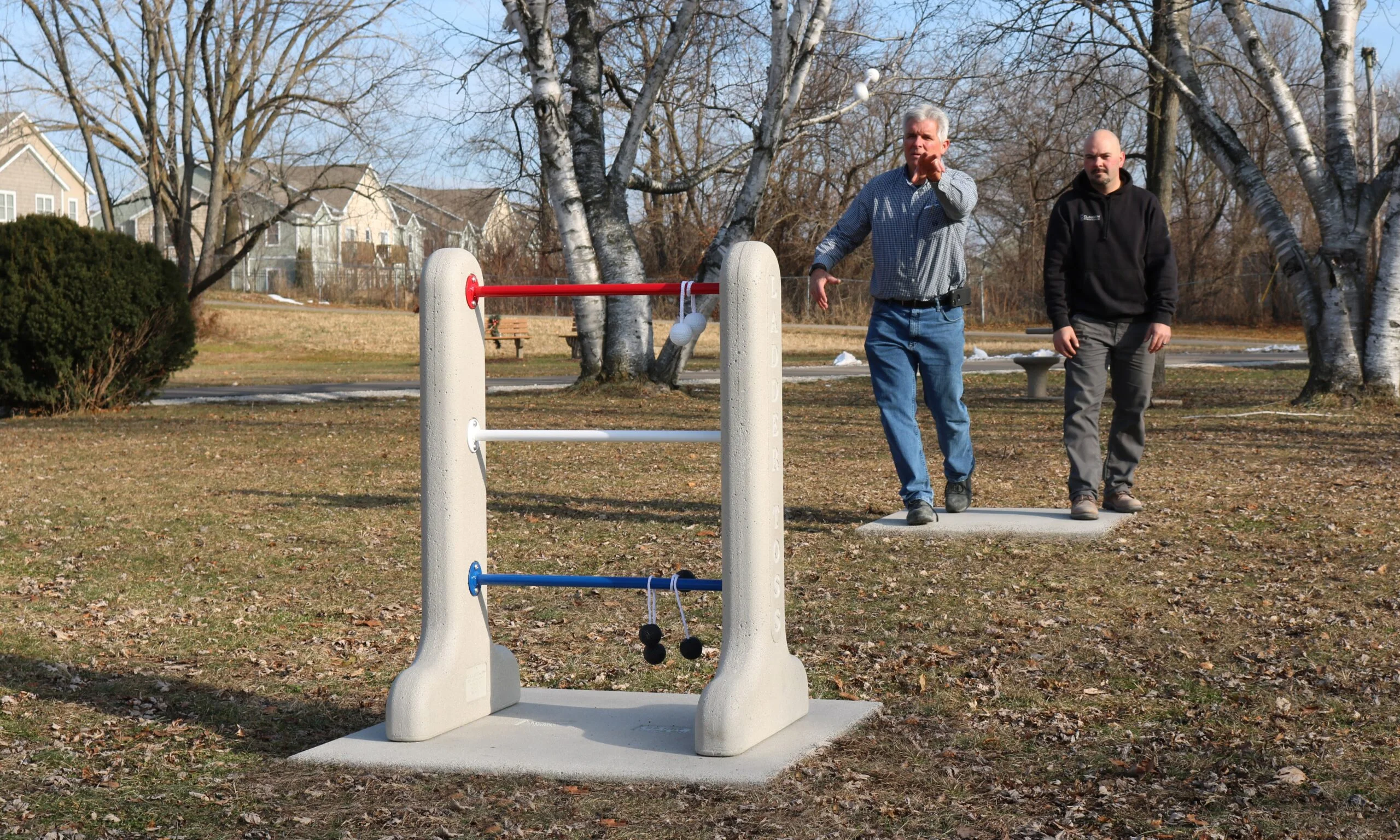 Outdoor agility training equipment in a park.