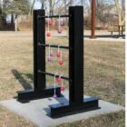 Outdoor fitness equipment in a park setting.