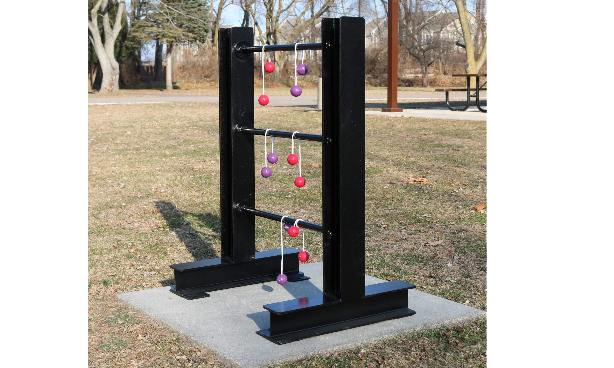 Outdoor fitness equipment in a park setting.