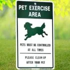 Pet Exercise Area sign on grass.