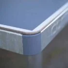 Close-up view of a laptop's corner.
