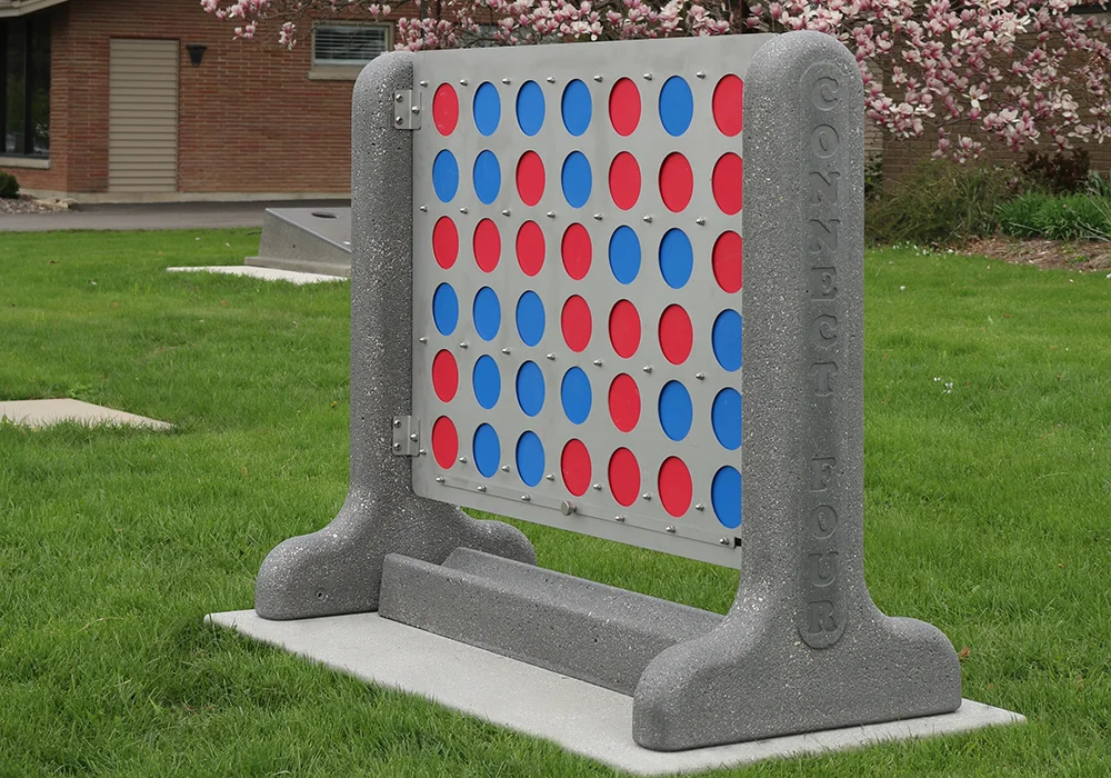 Outdoor game board with red and blue dots.