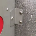 Metal bracket attached to concrete wall.