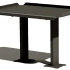 Black standing desk with adjustable height.