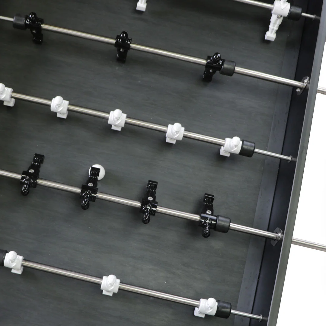Foosball table rods and ball holders.