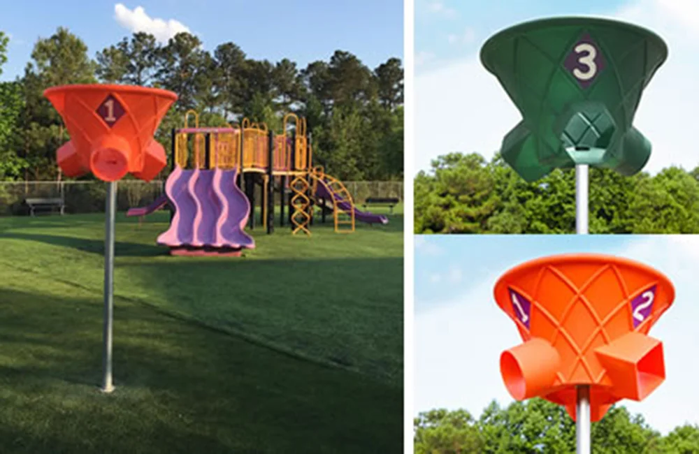 Playground equipment markers in orange and green.