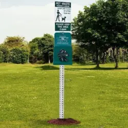 Pet waste disposal station in a park.