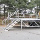 White metal ramp and platform on a truck.