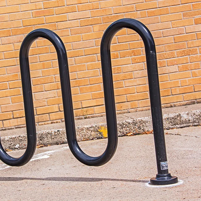 2T6A5418R Bike rack against a brick wall.