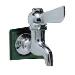 Water faucet handle on green background.