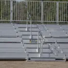 Metal bleachers in a stadium setting.