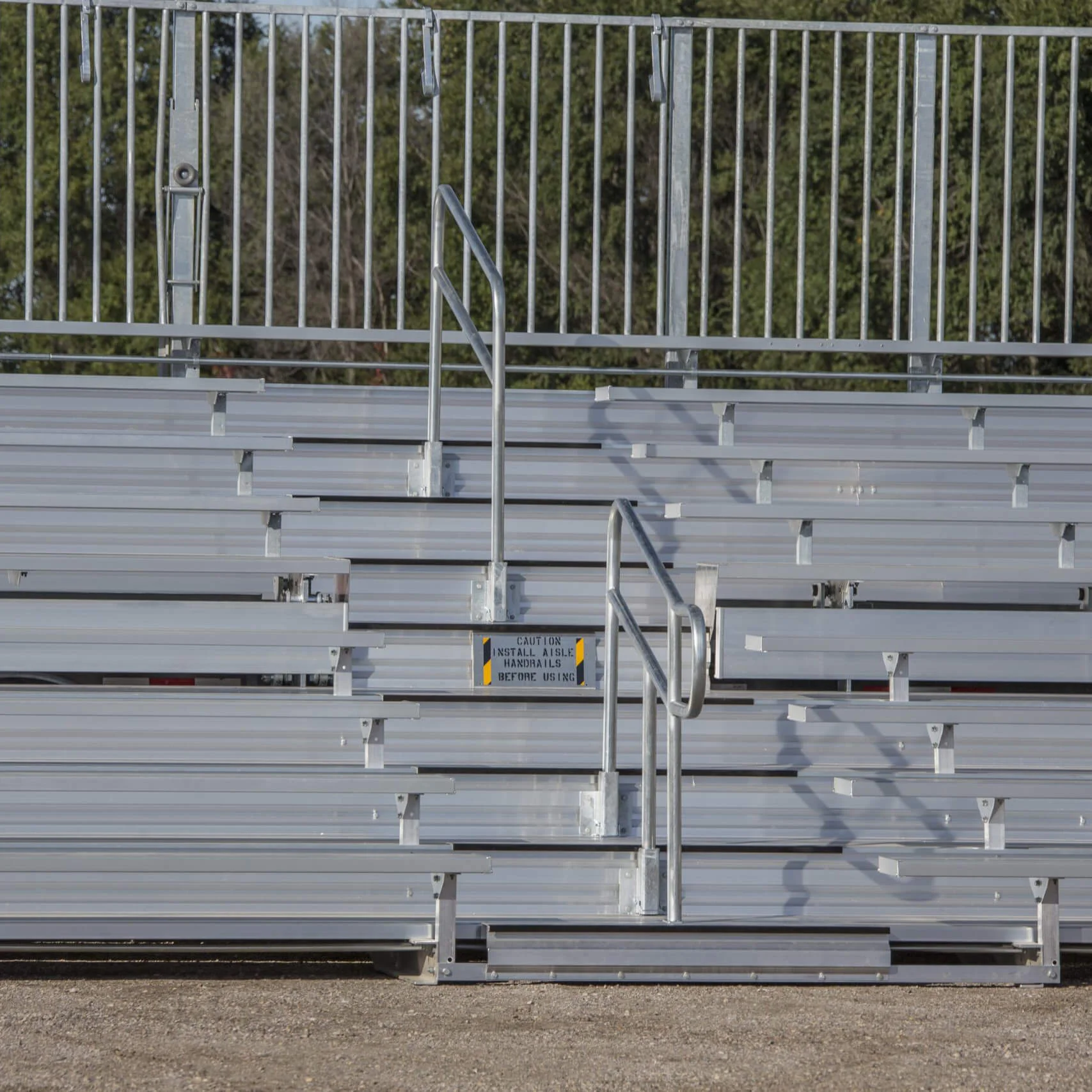 4509ROW072-scaled Metal bleachers in a stadium setting.