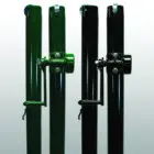 Metal poles with green and black handles.