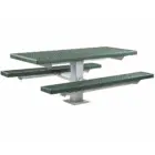 Outdoor picnic table with green top and benches.