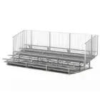 Metal bleachers with a white railing.