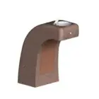Brown textured object with a curved top and a small white element.