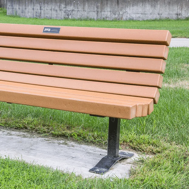 Contour-Bench Bench in a park setting.