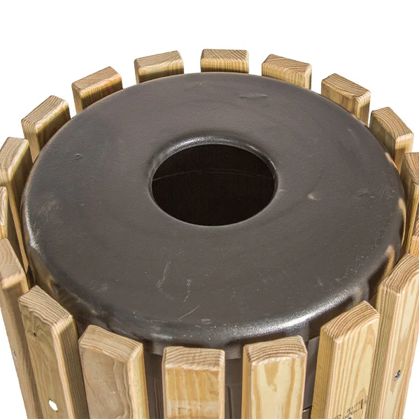 FLS8-32Web Black circular object surrounded by wooden posts.