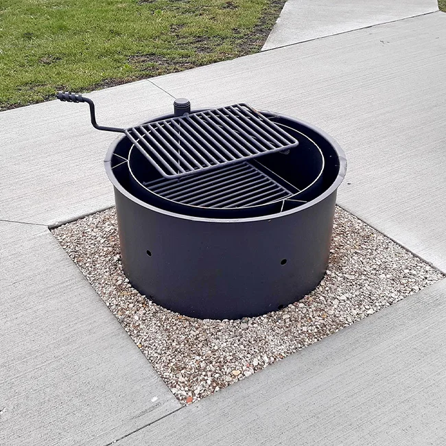 FRDW1830TB-web Outdoor grill on a concrete patio.