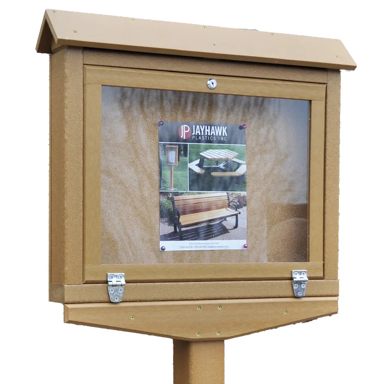 Outdoor information kiosk displaying a Jayhawk Plastics Inc. advertisement featuring outdoor furniture.